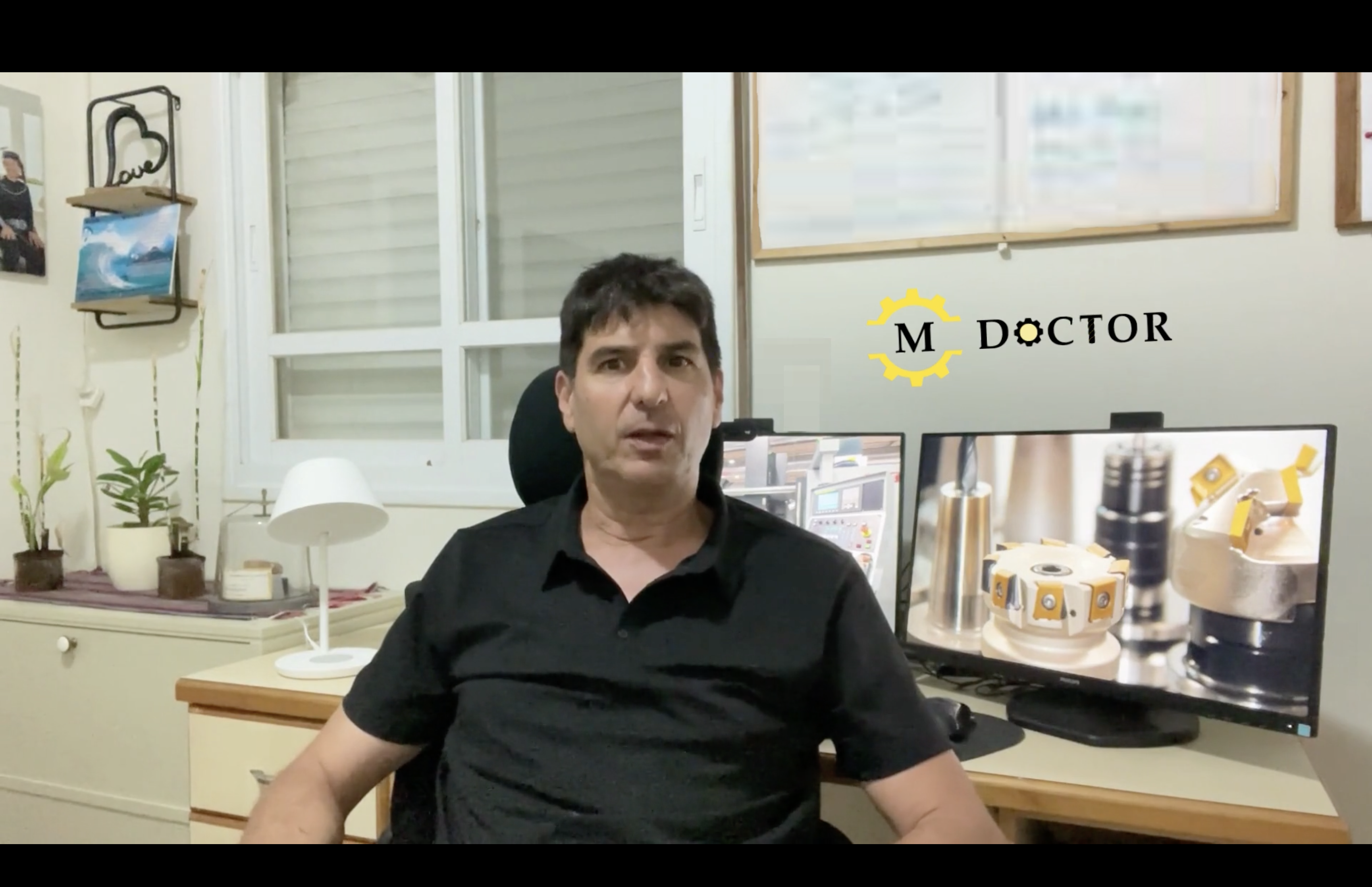 Still frame captured from video of Erez Speiser welcoming visitors to his website, MachiningDoctor.com.