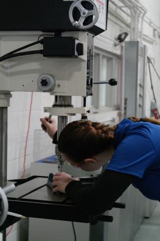 Rebekka Neumann, apprentice mechatronics technician, on the EMAG shop floor