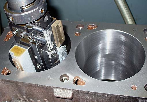 Honing an engine cylinder using Sunnen equipment