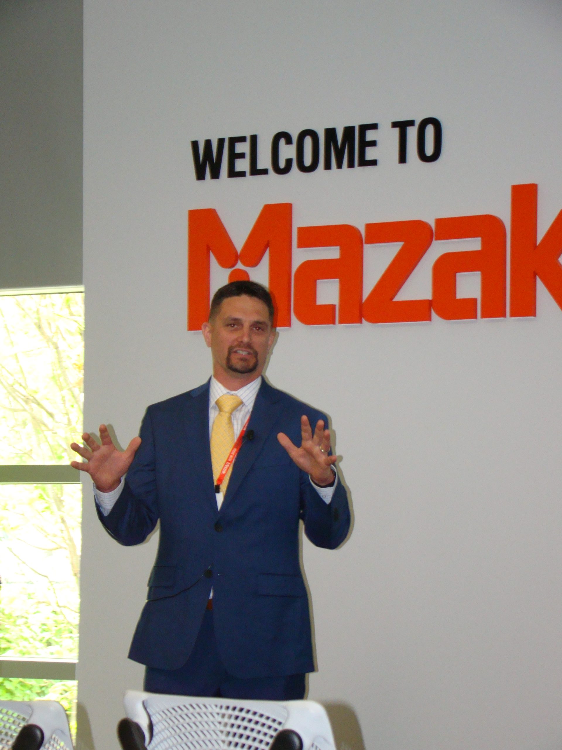 Dustin Sanks presenting at the Discover More With Mazak Midwest event