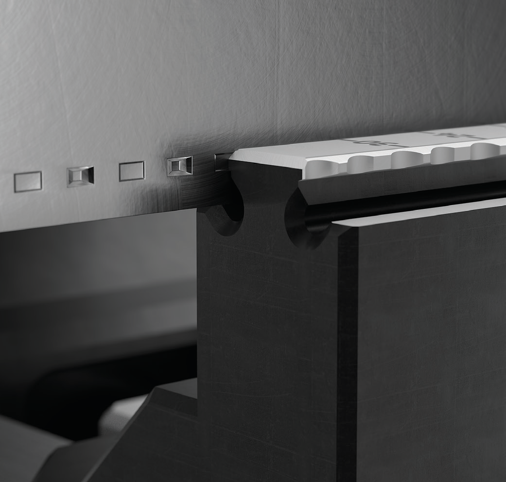 The Makro-Grip stamping unit produces dimples on the workpiece. Photo credit: Lang Technovation