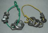 Keep a complete set of nuts on rings, with one ring for coarse threads and the other for fine threads. Image courtesy of Tom Lipton.