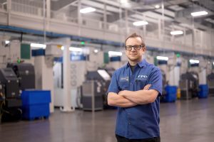 Machine shop uses forging press to reduce costs of titanium parts