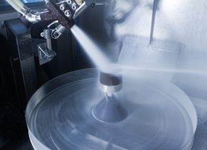 Post-processing AM parts with wet blasting