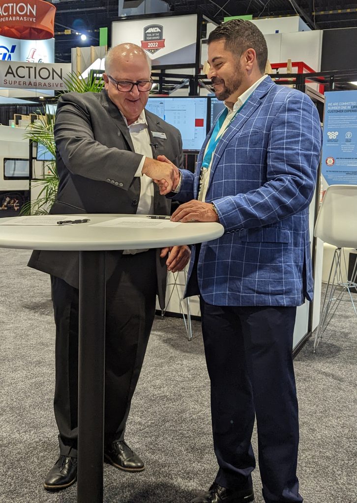 Russell Riddiford and Guillermo Ramirez sealing the deal