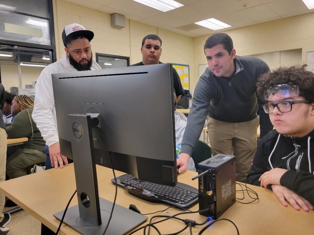 3 pc Andrew Crowe (L) with Students
