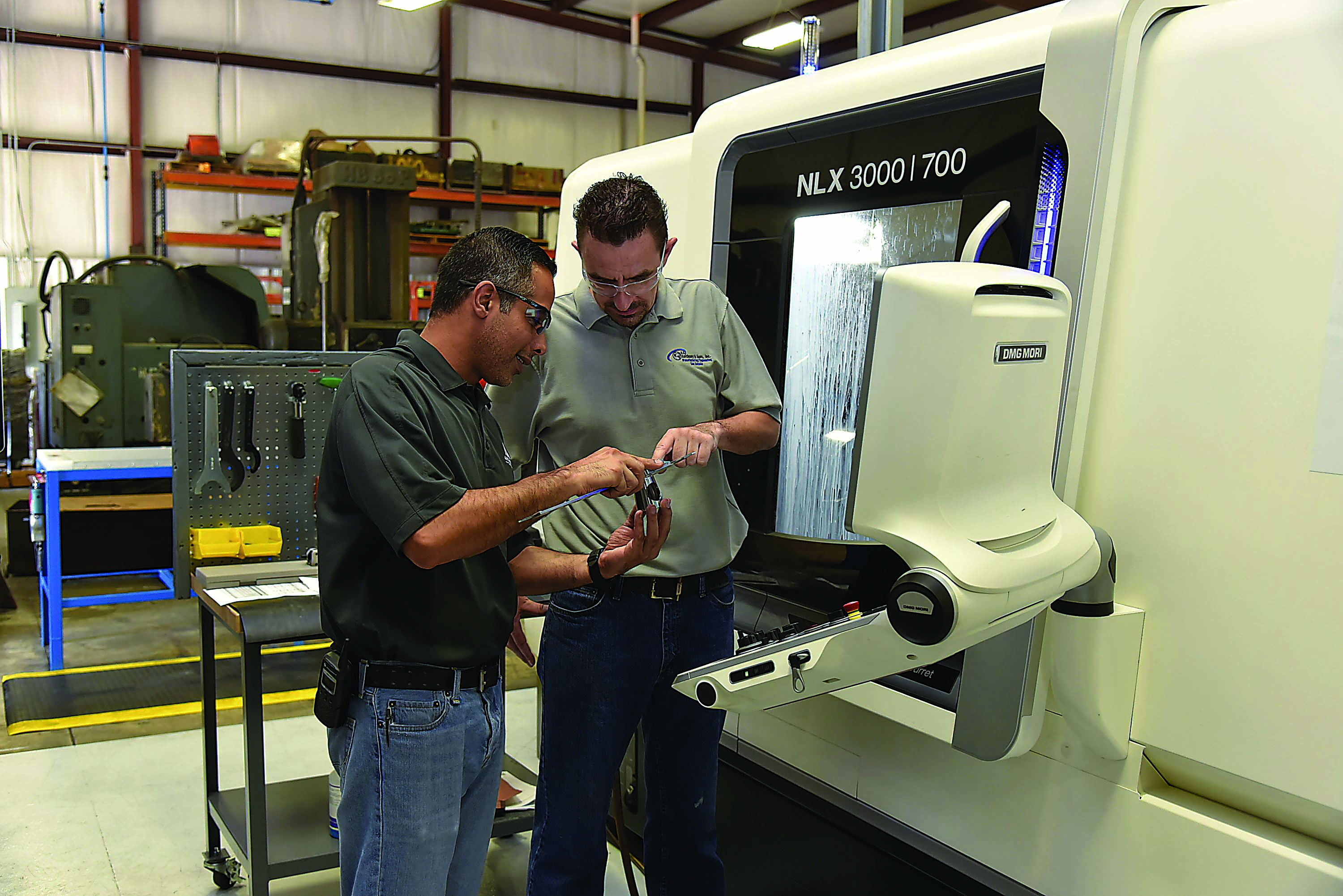 Mohsen Saleh (left) and CNC Machinist Setter Mark Garland. Photo credit: Kennametal.