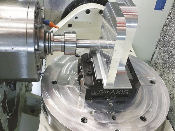 5th Axis workholders can grip large parts, such as this aluminum mounting bracket, even when there's a minimal amount of workpiece material to grip. Image courtesy Wagner Machine.