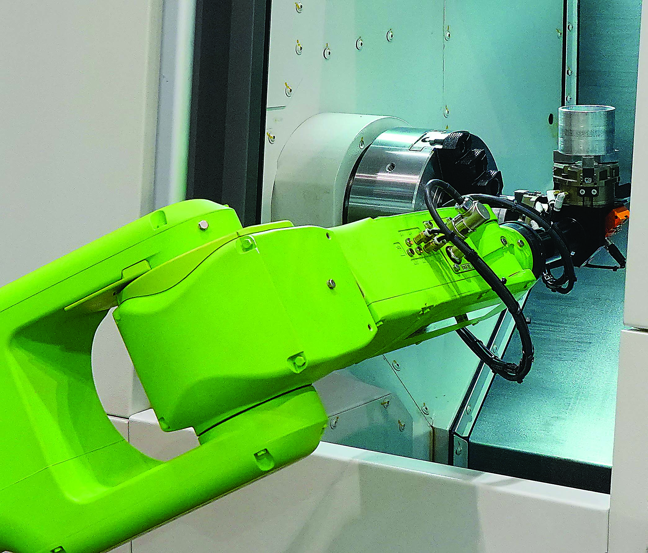 A FANUC CR-7iA cobot loads a lathe chuck. Image courtesy of FANUC America.
