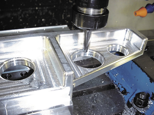 A ballnose endmill cuts an edge radius around a hole using the 3D method. A ballnose endmill cuts an edge radius around a hole using the 3D method.