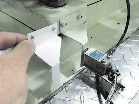 Low-tech still has its place. For example, it's a good idea to construct a cardboard model of an odd-shaped bracket to see how it fits on a machine before releasing a drawing.
