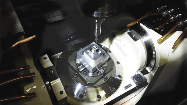 Full 5-axis contouring, as well as 3+2 positioning, of microparts is possible on this this tilt-rotary-equipped Microlution machining center. Image courtesy Industrial Machine Works. Full 5-axis contouring, as well as 3+2 positioning, of microparts is possible on this this tilt-rotary-equipped Microlution machining center. Image courtesy Industrial Machine Works.