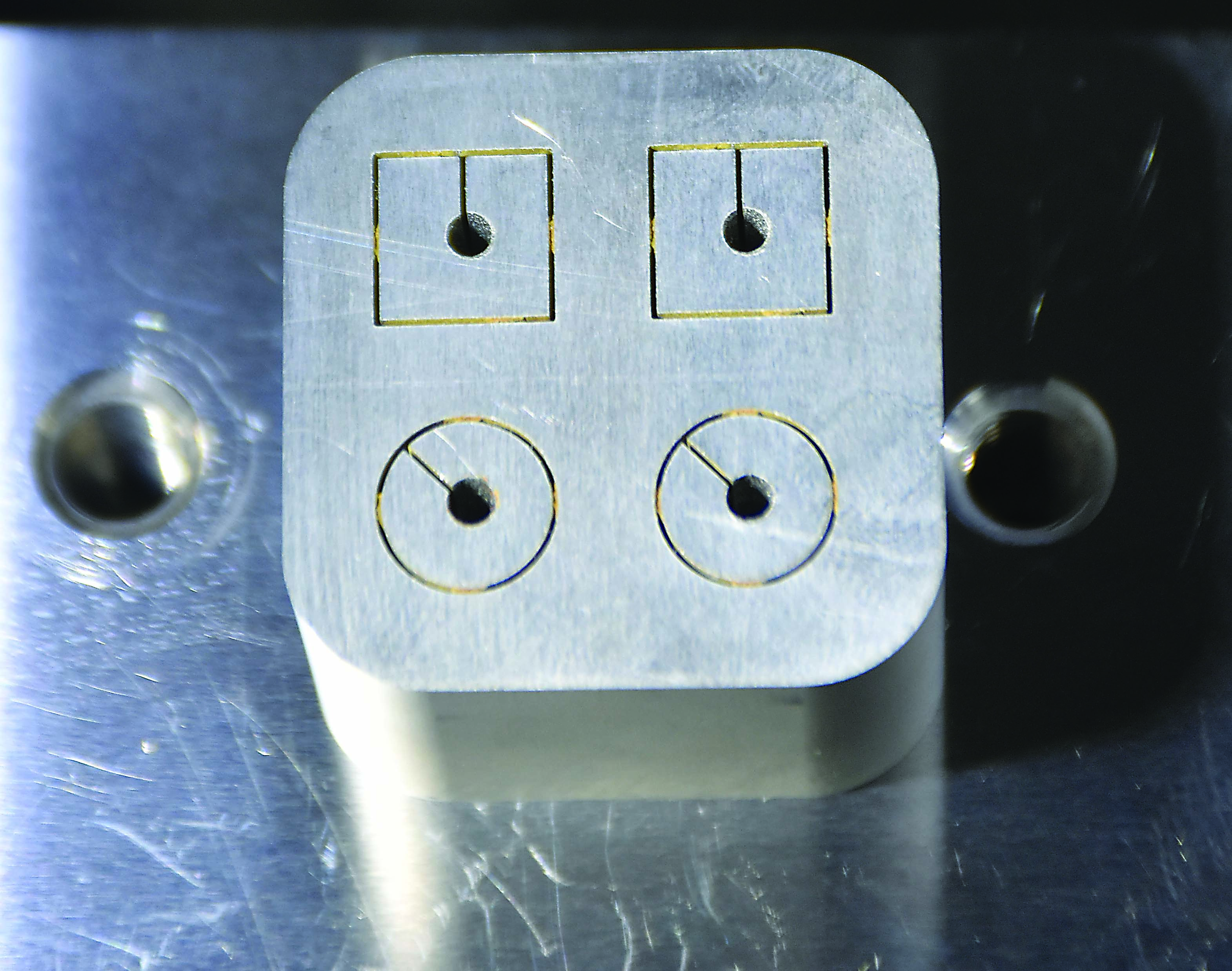 FANUC America's Core Stitch function uses a reverse discharge process to retain slugs in the workpiece. They then can be removed with a few light taps from a hammer. Image courtesy of Methods Machine Tools.