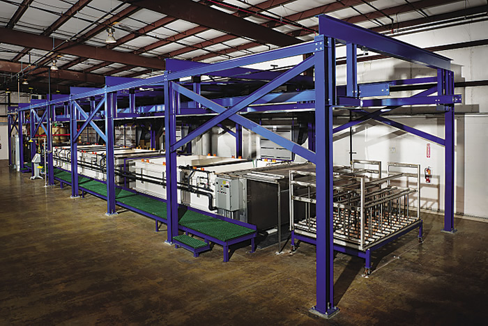 This passivation line is automated and capable of processing thousands of parts per day. Image courtesy PKG Equipment. This passivation line is automated and capable of processing thousands of parts per day. Image courtesy PKG Equipment.