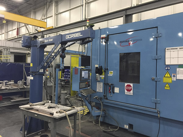 A jib crane moves parts and fixtures around the area for waterjet machining at Mitsubishi Hitachi Power Systems Americas. 
