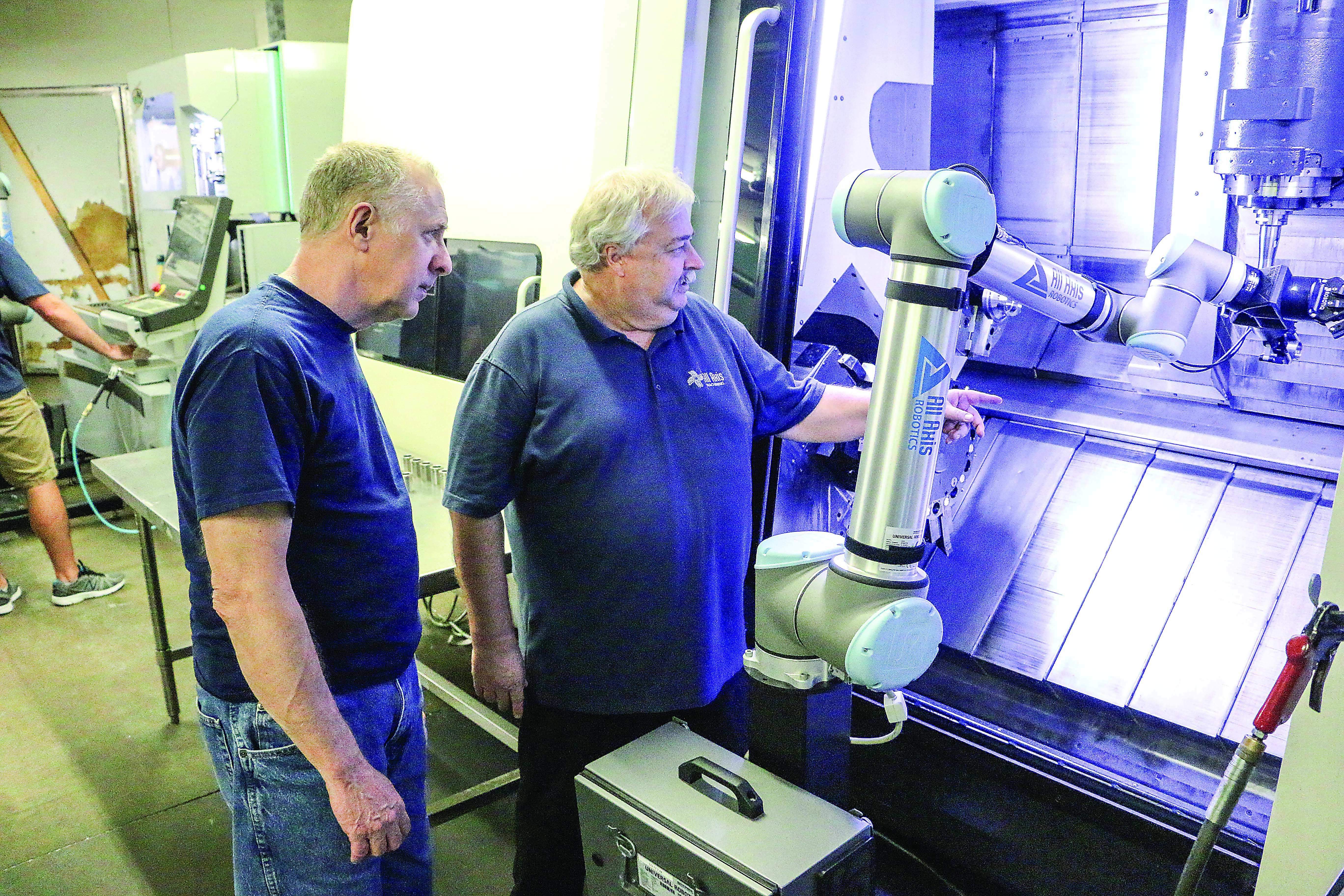 The open architecture of Universal Robots' cobot arms enabled All Axis Machining Inc. to automate six different operations. Photo credit: Universal Robots USA
