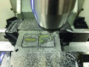Thermocouples embedded in coating of cutting insert measures tool/chip temperature