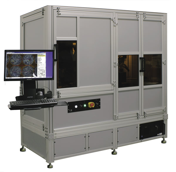 PhotoMachining's three-wavelength, ultrashort-pulse micromachining system can drill high-density holes in polymers. Image courtesy PhotoMachining.