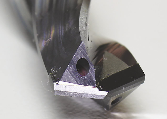 A solid, cross-center PCD-tipped drill, on which both cutting edges and the drill tip are made from a single piece of PCD. Image courtesy West Ohio Tool. A solid, cross-center PCD-tipped drill, on which both cutting edges and the drill tip are made from a single piece of PCD. Image courtesy West Ohio Tool.