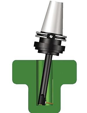 A model of Eltool's angle head shows the head being tilted to position the cutting tool near the bottom of a bore. A model of Eltool's angle head shows the head being tilted to position the cutting tool near the bottom of a bore.