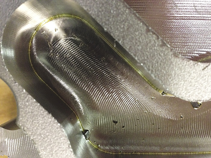 Trochoidal toolpaths are suitable in tight areas, such as slots and small pockets. Trochoidal toolpaths are suitable in tight areas, such as slots and small pockets.