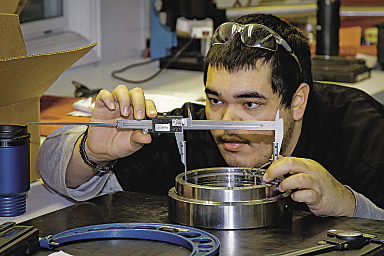 Juan Pacheco takes measurements as part of his operator training at LeanWerks. Image courtesy LeanWerks. Juan Pacheco takes measurements as part of his operator training at LeanWerks. Image courtesy LeanWerks.