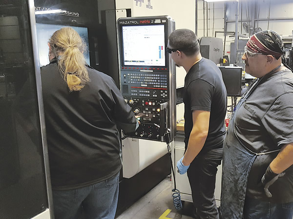 A group of students receives offset training on a Mazak Integrex machine tool. Image courtesy LeanWerks. A group of students receives offset training on a Mazak Integrex machine tool. Image courtesy LeanWerks.