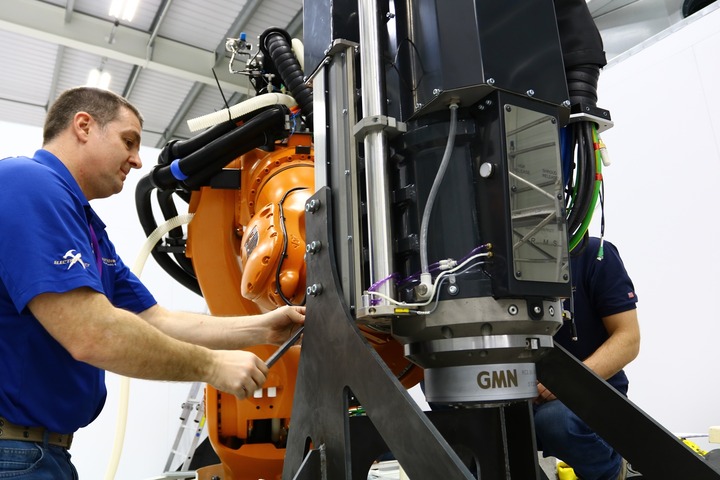 Electroimpact engineers install a modified KUKA titan robot at AMRC's Factory 2050. Credit: AMRC Large-volume robotic machining just got more accurate image