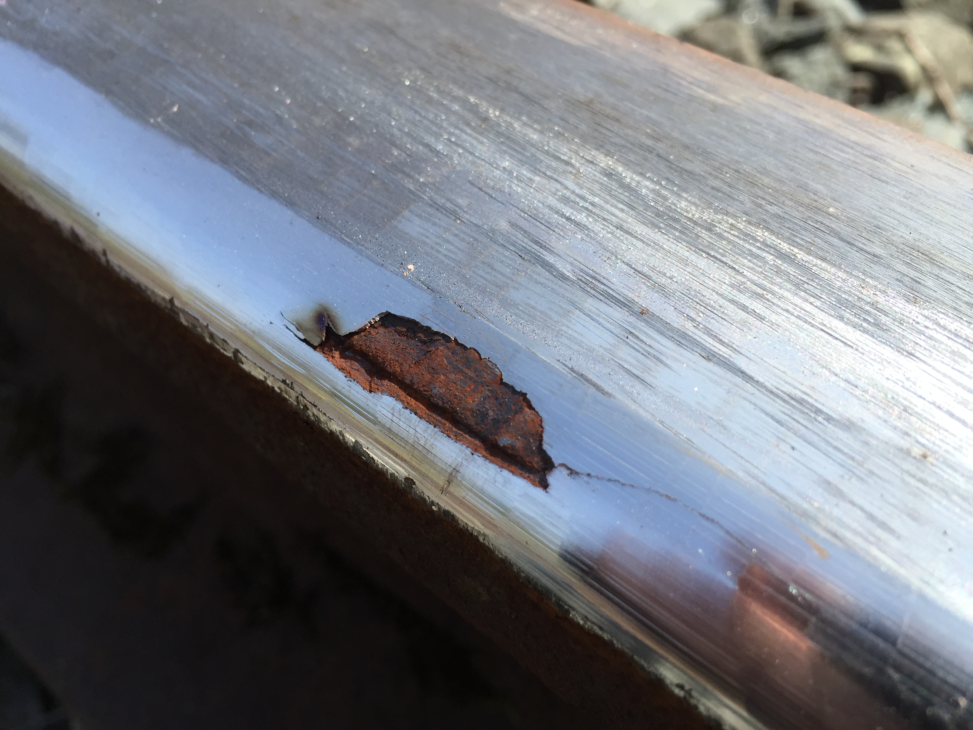 A pitted rail which requires renovation. A pitted rail which requires renovation.