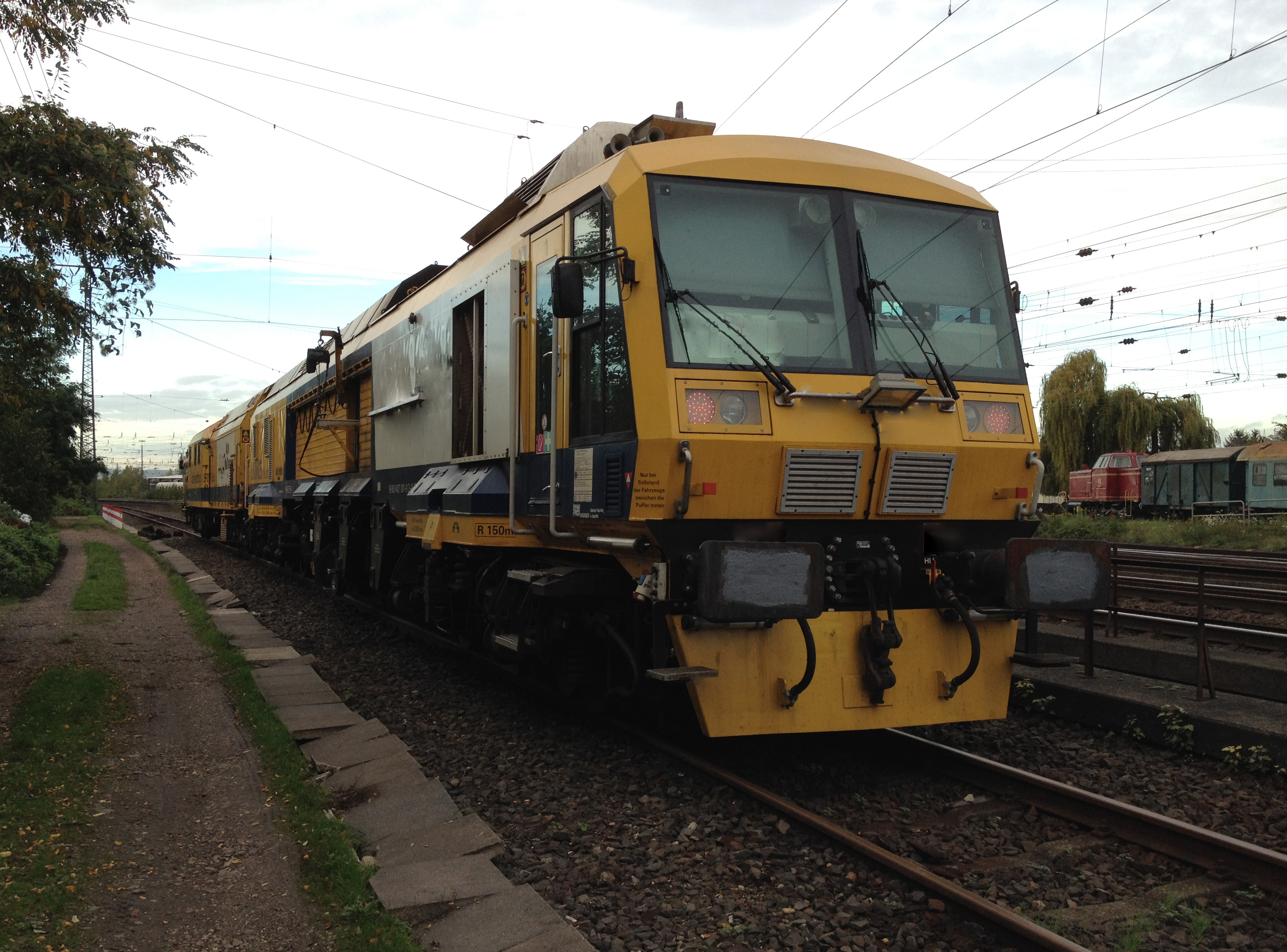 A train dynamically milling a railway line. A train dynamically milling a railway line.
