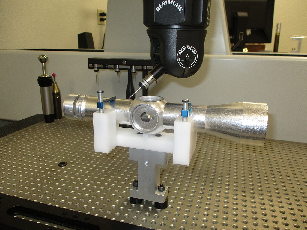 Different riflescope components being measured by the LK Metrology Altera 'S' CMM
