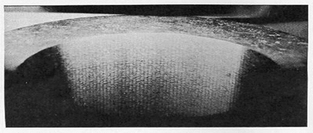 An internally ground part with chatter marks.