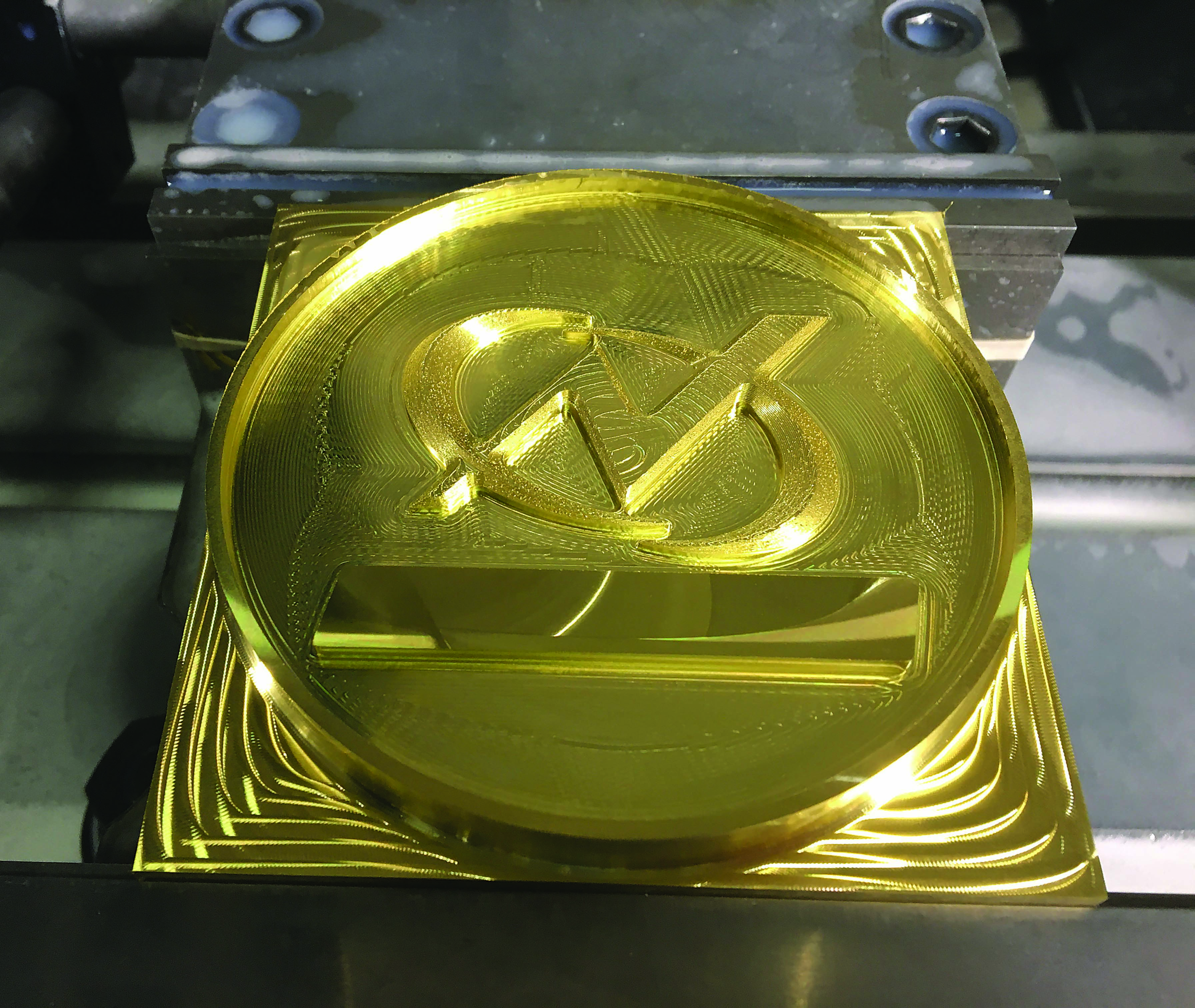 Window machining is a process in which the internal details are created while the part is secured by a breakaway section of material that eventually is removed.