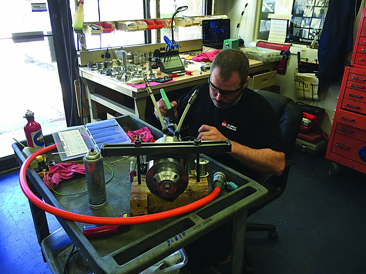 GTI's Johnny Johnson works on a Bryant spindle.