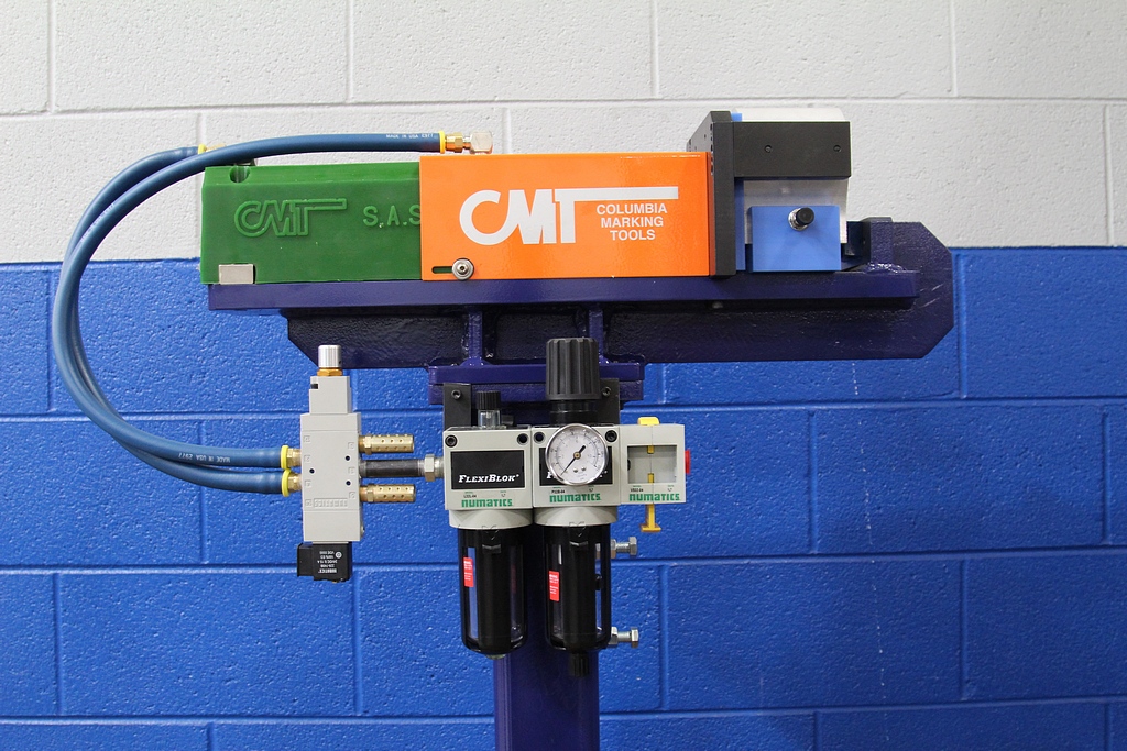 Fig. 2 CMT turnkey impact marking station for robot cell with S.A.S system