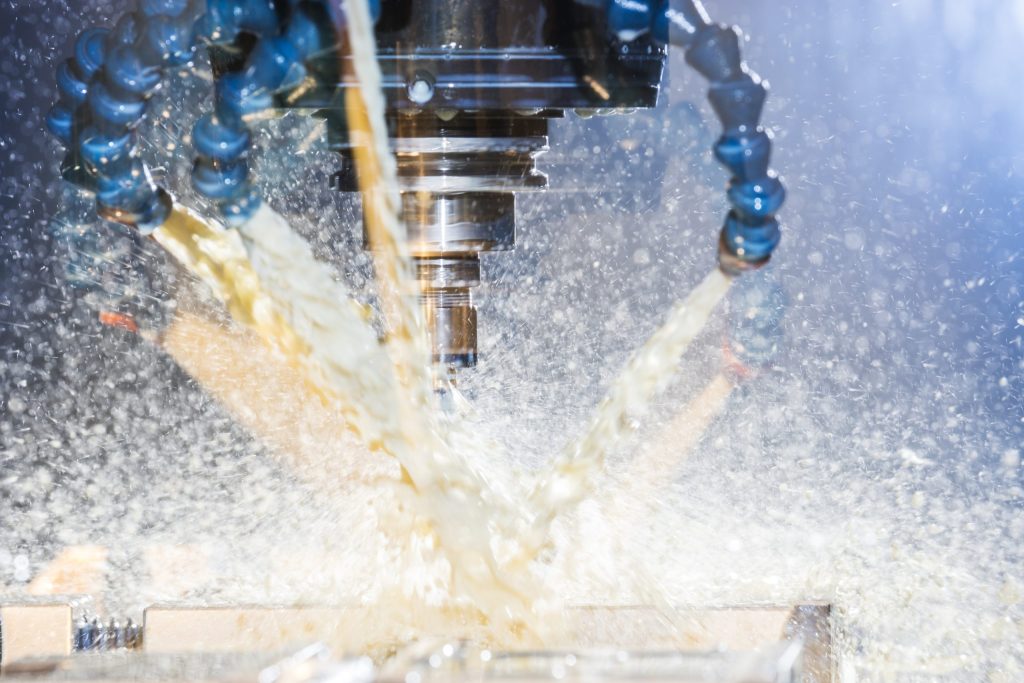 Modern, high tech, CNC, metal milling machine in use.